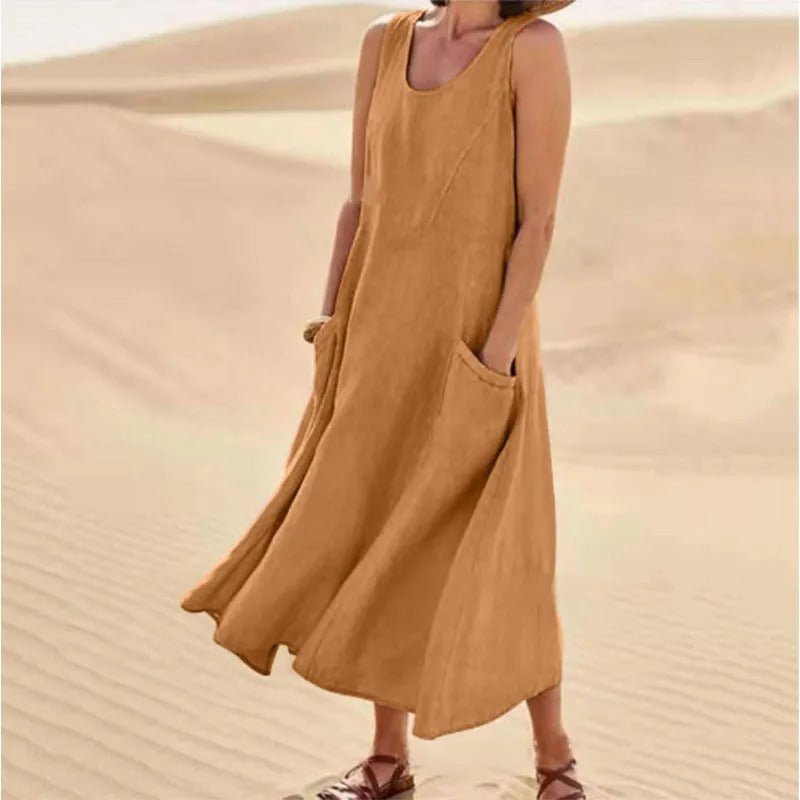 Flowy sleeveless U-neck maxi dress with pockets, women's boho style, ideal for summer casual outings.