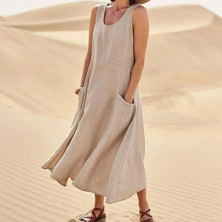 Summer casual U-neck maxi dress for women, with pockets; versatile sleeveless design for everyday boho style.