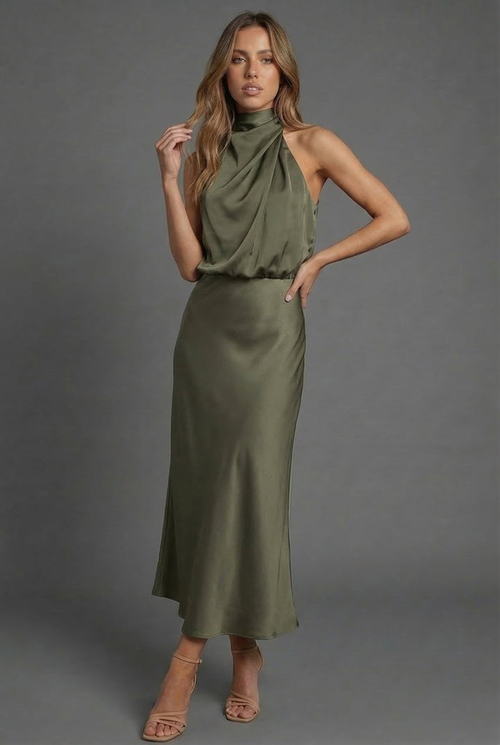Sophisticated women's halter neck midi dress for summer formal occasions or wedding guests.