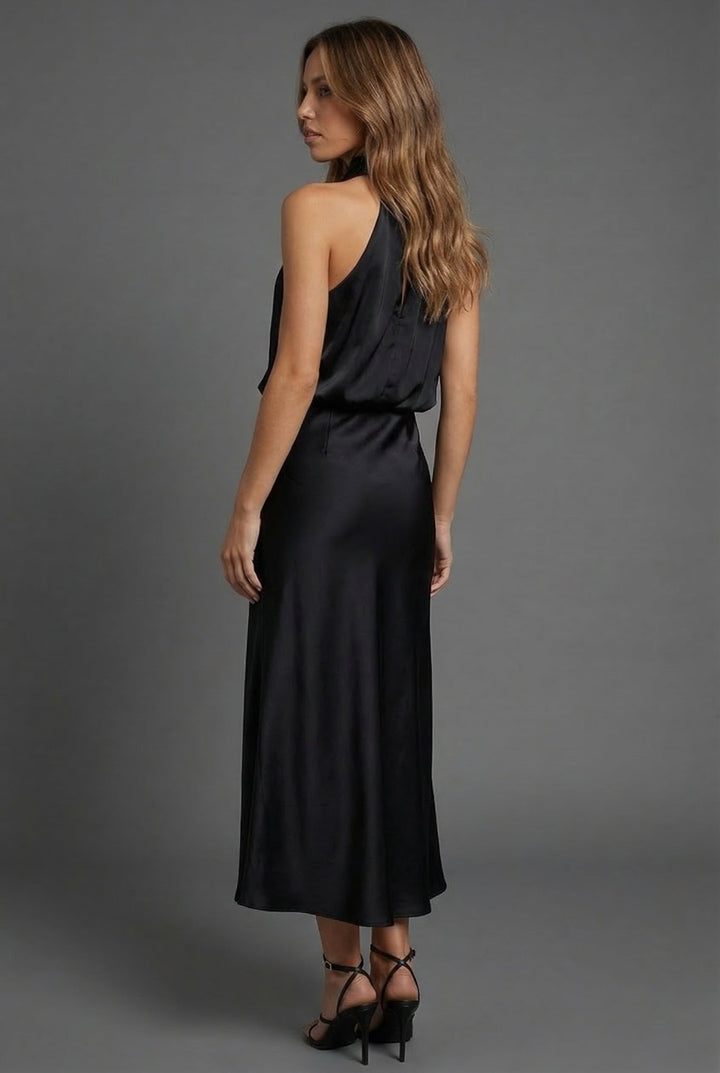 Stylish women's halter neck midi dress for summer parties and cocktail events. Wedding guest attire.
