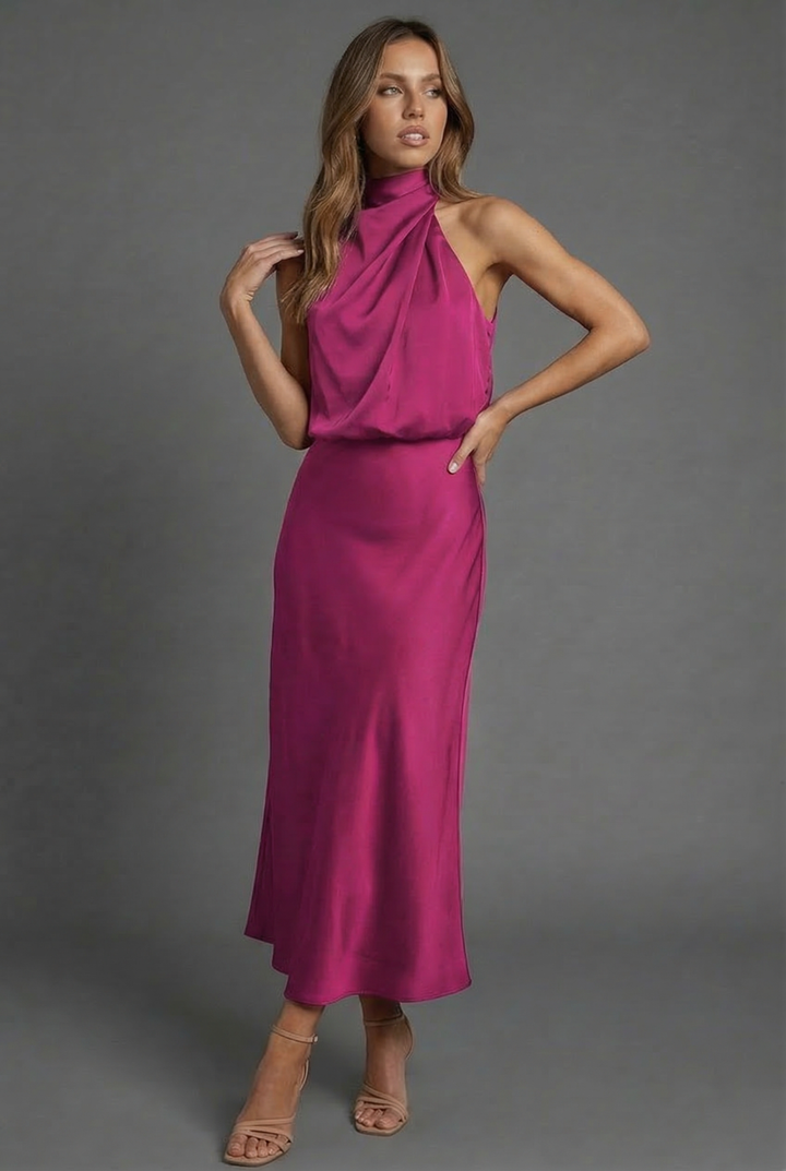 Halter neck midi dress for women, open back design. Perfect elegant summer wedding guest attire.