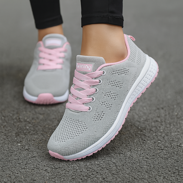 Lace-up women's athletic walking shoes, versatile sneakers for active lifestyles & everyday comfort.