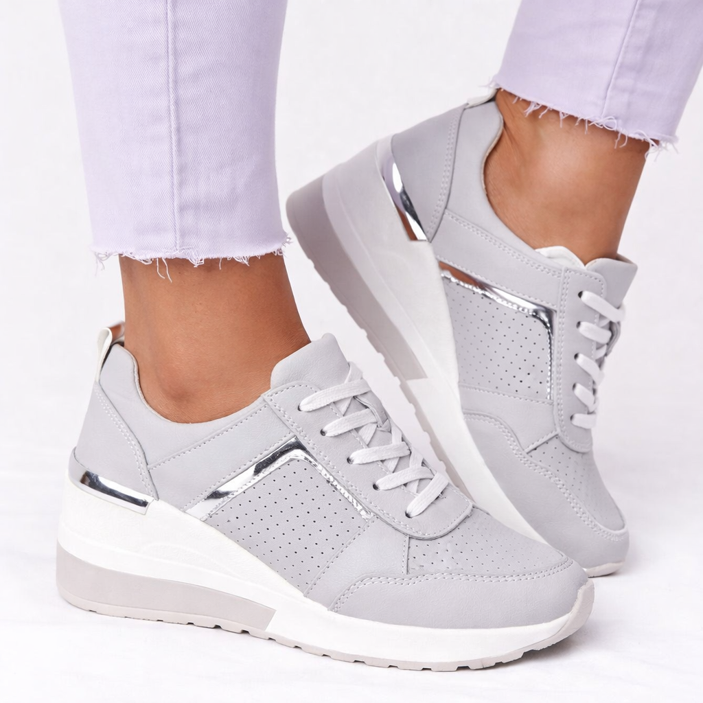 Comfortable women's wedge trainers with a supportive fit, ideal for everyday walking and casual outfits.