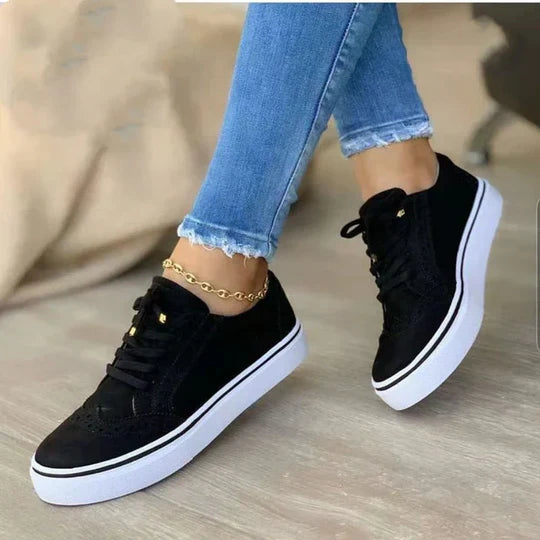 Casual women's lace-up sneakers offering supportive all-day comfort, great for everyday wear & walking.