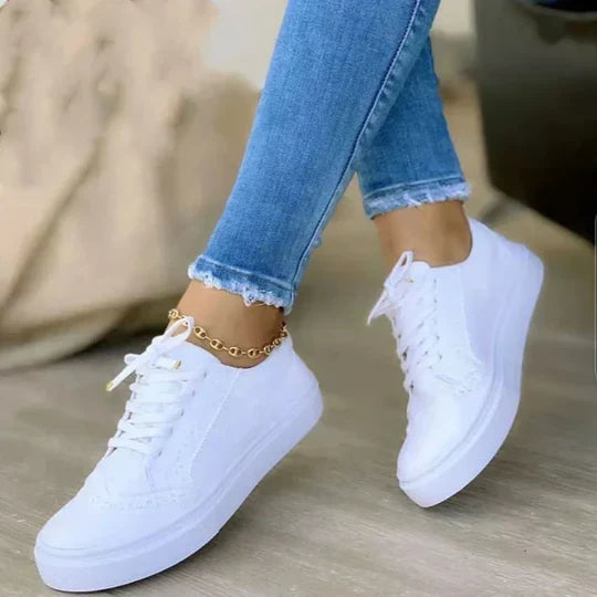 Supportive women's lace-up sneakers ensuring all-day comfort, perfect casual footwear for ladies' everyday activities.
