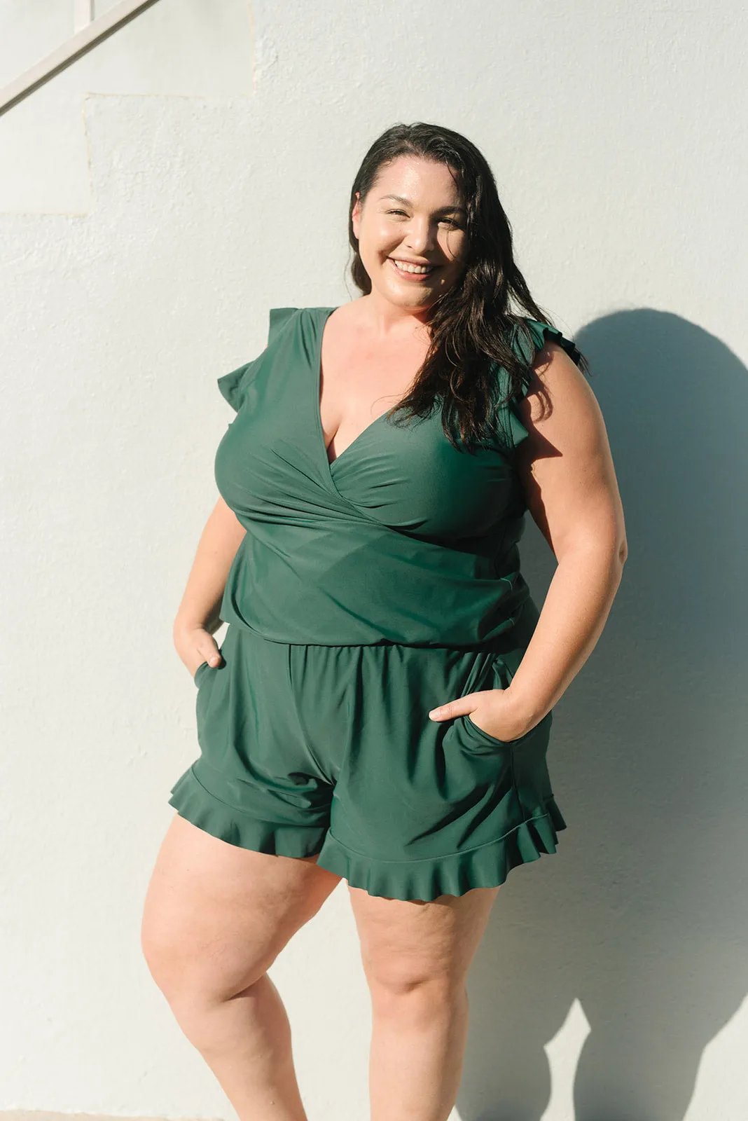 Women's supportive one-piece bathing suit, built-in bra, flattering fit, comfortable beachwear.