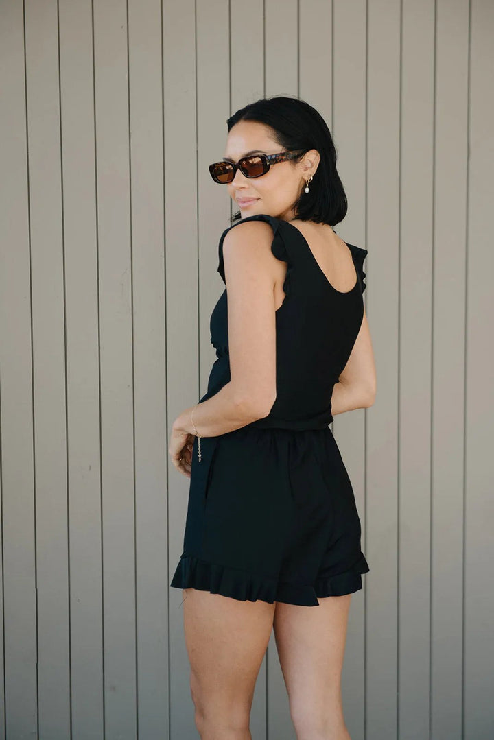 Flattering women's swimsuit, one-piece design with built-in bra for stylish & confident poolside wear.