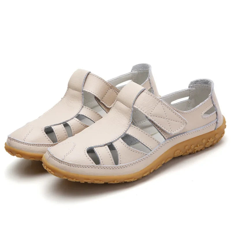 Close-up: Slip-resistant sole on women's orthopedic sandals for safety & comfort.
