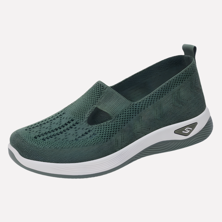 Active women's walking shoes with orthopedic arch support for enhanced performance.