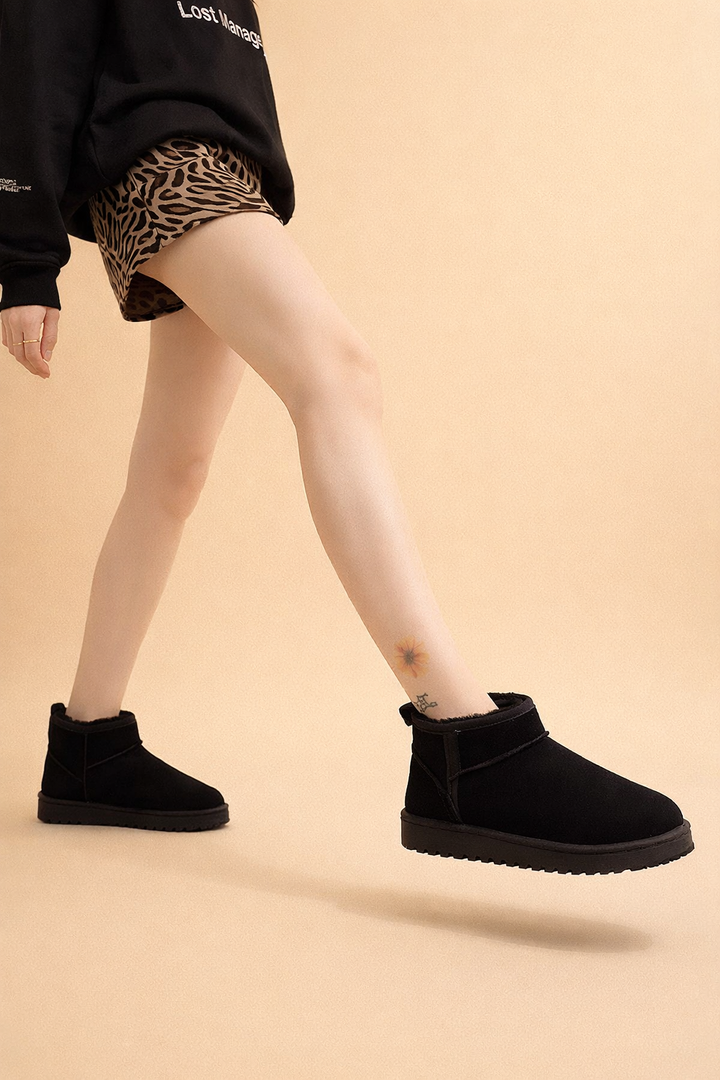 Women's supportive winter snow boots with a textured design, perfect for cozy comfort in cold weather.
