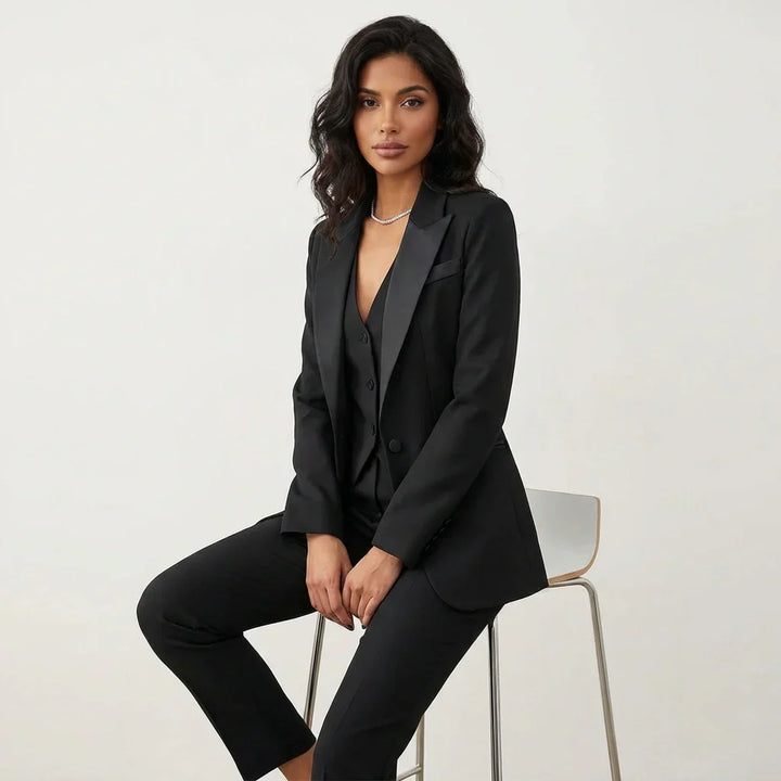 Stylish woman in a sophisticated 3-piece tailored suit, perfect for workwear, business, or formal occasions.