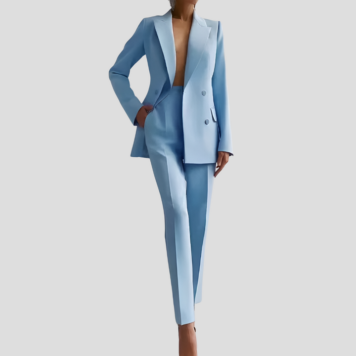Women's tailored blazer and trouser co-ord set in a sophisticated solid color, perfect for office wear.