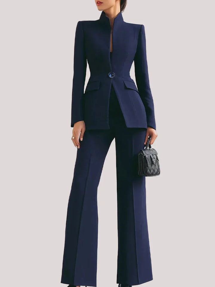 Women's tailored blazer & flared trousers suit set. Elegant two-piece for formal or business attire.