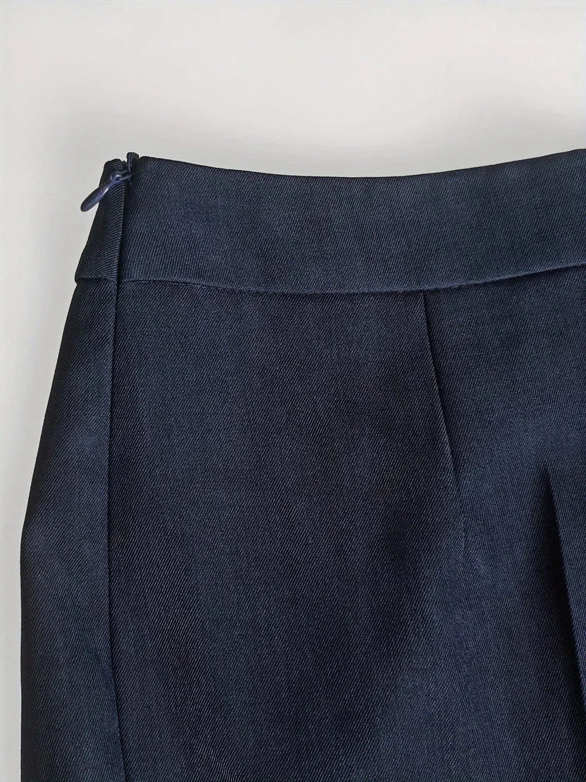 Modern women's tailored power suit. Features a smart stand collar blazer & fashionable flared trousers for elegance.