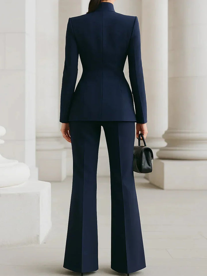 Versatile women's tailored suit set: professional longline blazer & flared trousers. Great for formal & business.