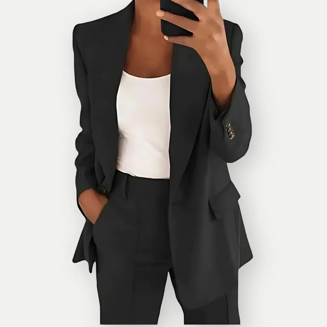 Elegant women's business suit, a two-piece tailored blazer and trousers for formal events.