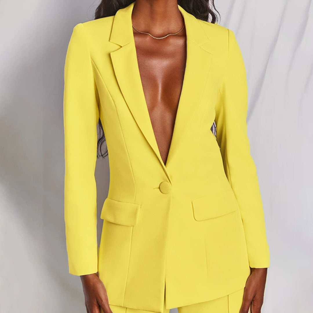 Elegant women's tailored pantsuit with a classic blazer and matching trousers for formal wear.