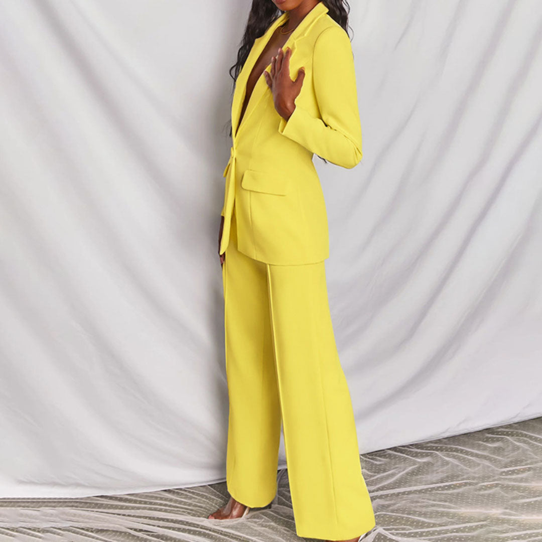 Stylish women's office wear: tailored blazer and trousers set for a sophisticated professional look.