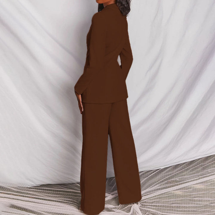 Classic women's professional suit: tailored blazer with buttons & straight-leg trousers for office elegance.
