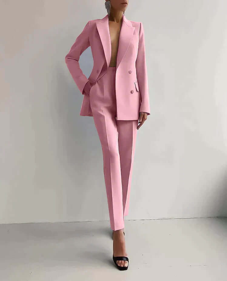 Modern women's tailored blazer and trousers set. Effortless professional chic for work and business attire.
