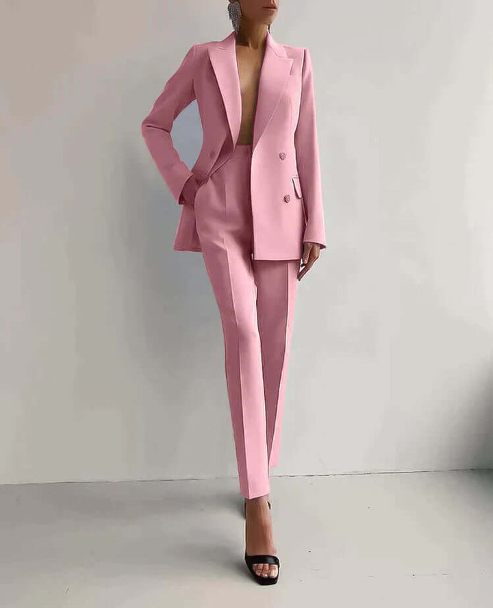 Modern women's tailored blazer and trousers set. Effortless professional chic for work and business attire.