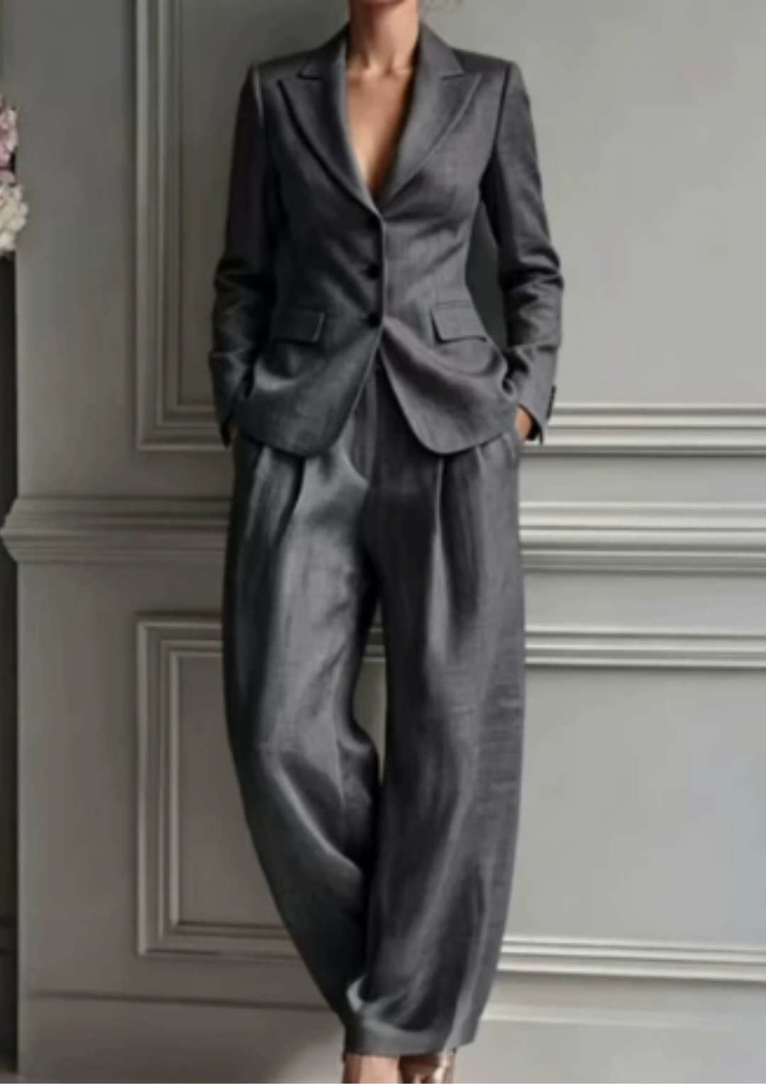 Chic women's tailored blazer and wide-leg trouser set, offering a modern, dressy two-piece look for various occasions.