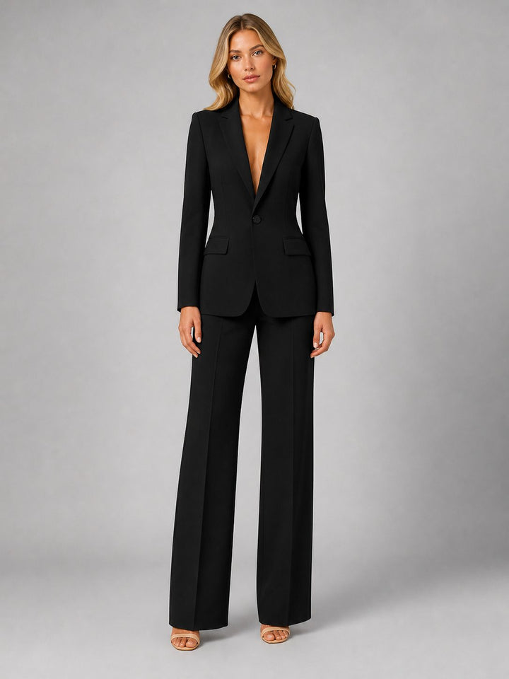 Professional women's set: a perfectly tailored blazer and comfortable wide-leg trousers. Ideal formal workwear.