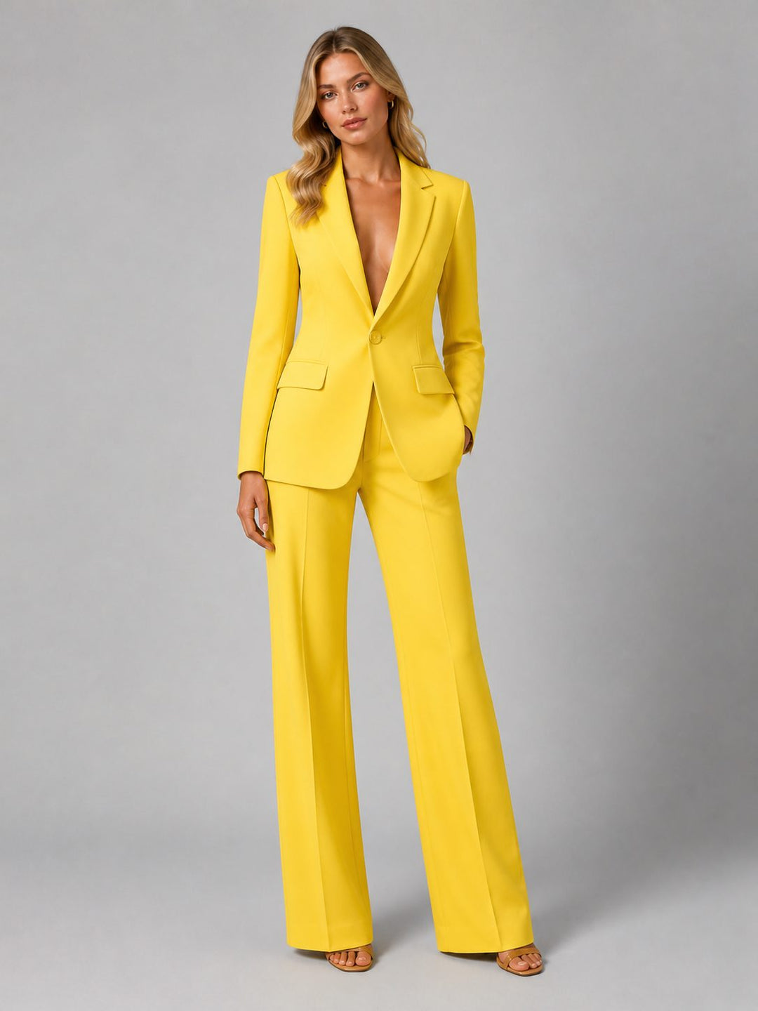 Versatile women's tailored blazer and wide-leg trousers set, showcasing a modern fit for business or special events.