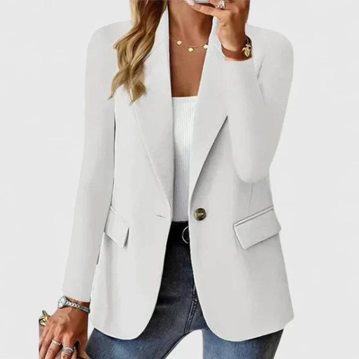 Stylish tailored women's blazer with a sleek lapel and single button, ideal for a refined professional look.