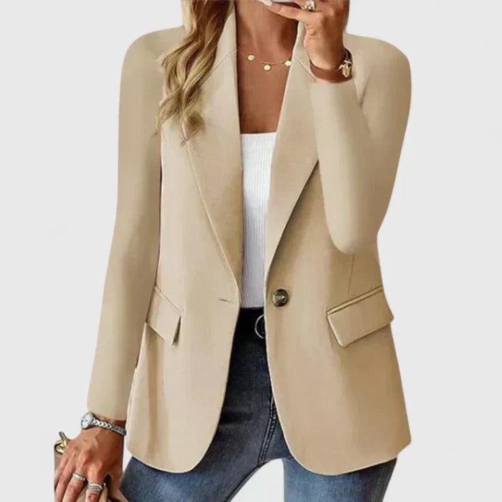 Fashionable women's long sleeve blazer, tailored fit, prominent lapel, and chic single button closure.