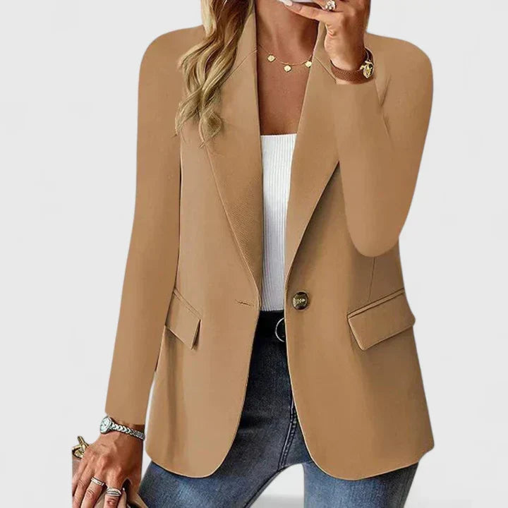 Versatile women's tailored jacket, a single-button lapel blazer suitable for office or elegant casual wear.