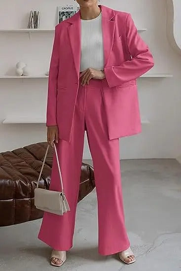 Women's tailored business suit set, featuring a structured blazer & matching trousers for a professional look.