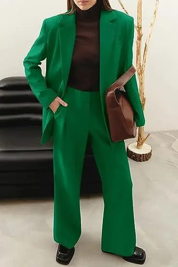 Elegant women's power suit for business, a complete tailored set with a stylish blazer & trousers.