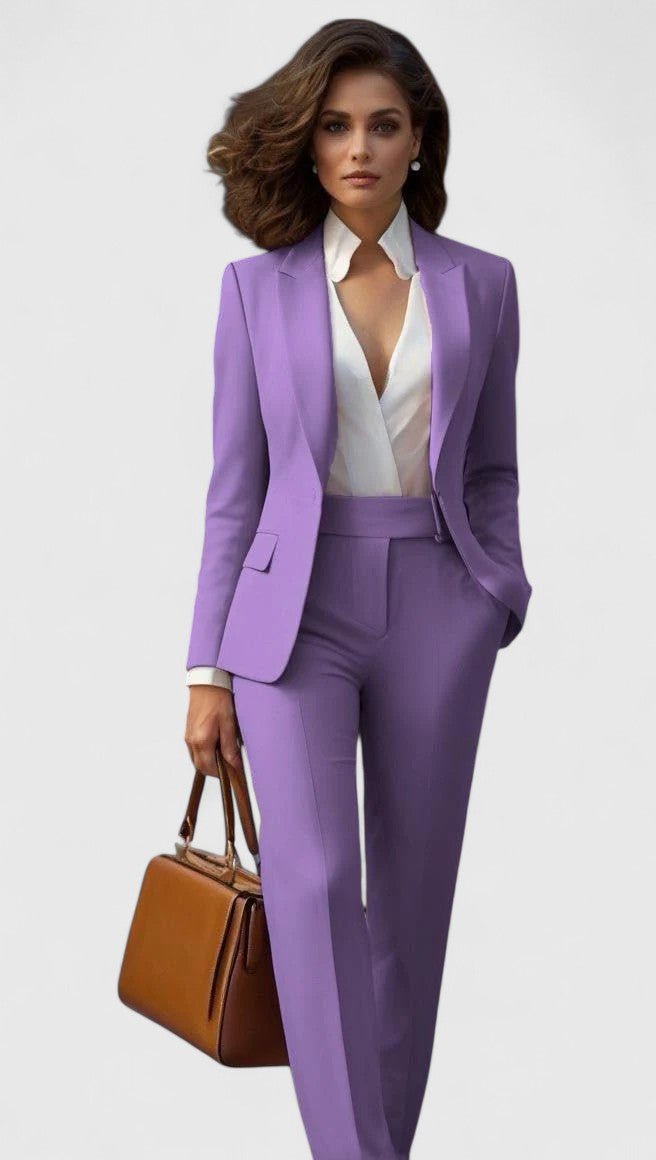 Premium women's workwear suit. Executive style tailored blazer and trousers for professional elegance.