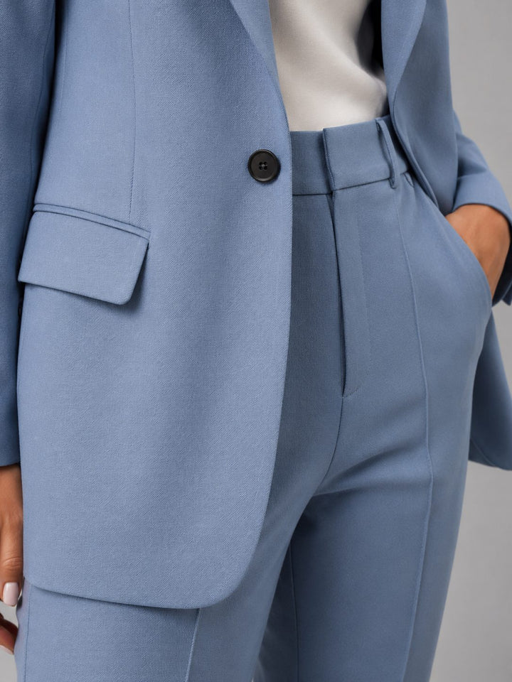 Chic women's tailored blazer, part of a high-waist straight leg suit set. Perfect for business attire.