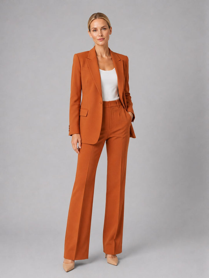 Close-up of a women's tailored suit set showing the quality fabric & straight leg, high-waist design.