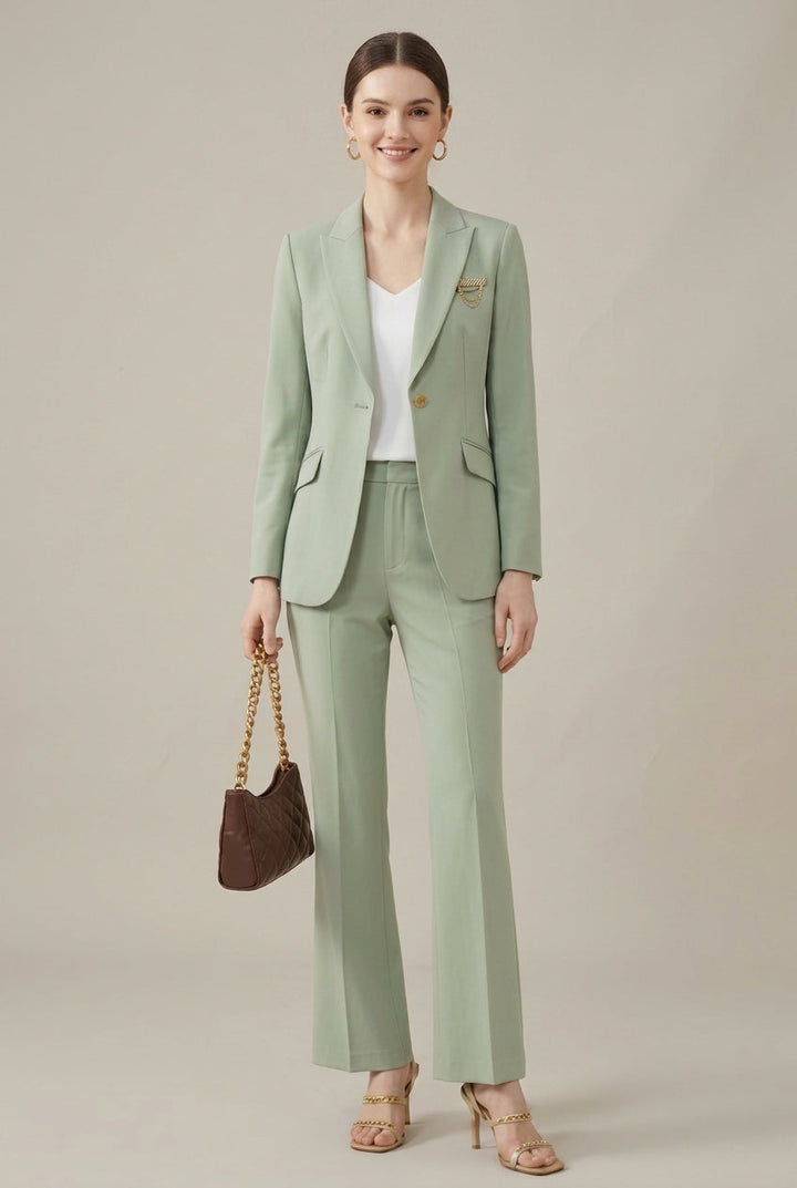 Women's tailored pant suit with sleek shawl collar blazer & gold buttons. Perfect for office or professional wear.
