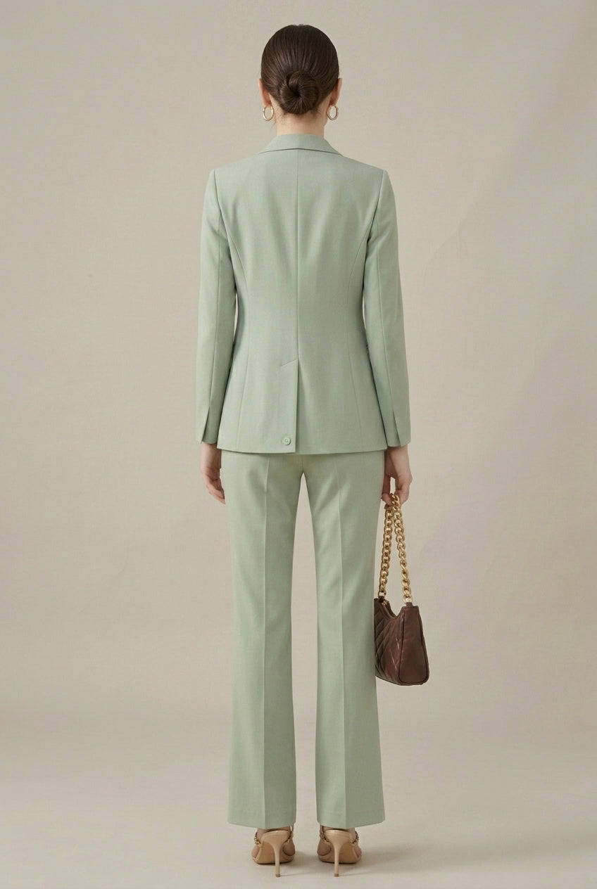 Professional women's tailored suit. Shawl collar blazer & smart trousers. Ideal formal office attire.