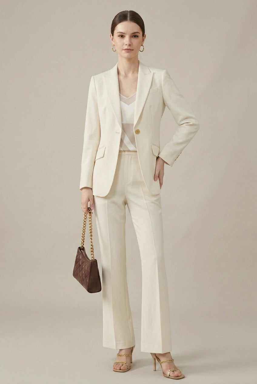 Smart casual women's blazer and pant set. Tailored for a professional look. Elegant office wear.
