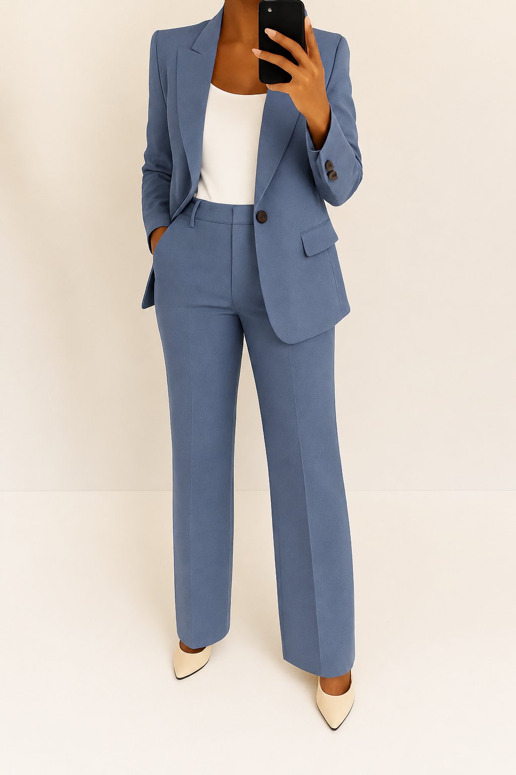 Women's tailored professional suit set with a blazer & trousers, ideal for business and office wear.