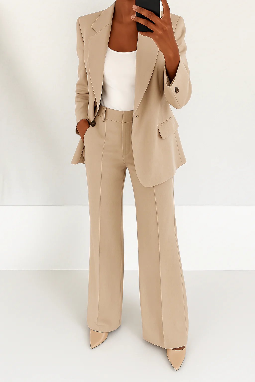 Formal women's power suit with a stylish blazer & pants, essential business wear for career professionals.