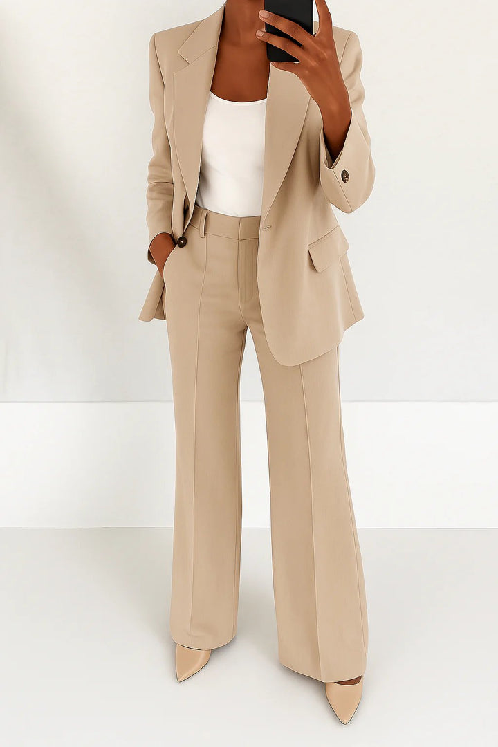 Formal women's power suit with a stylish blazer & pants, essential business wear for career professionals.