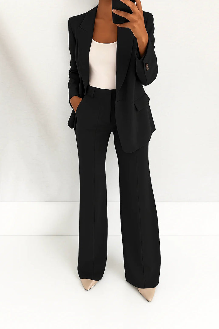Complete women's two-piece professional suit set with a modern tailored blazer and comfortable trousers.