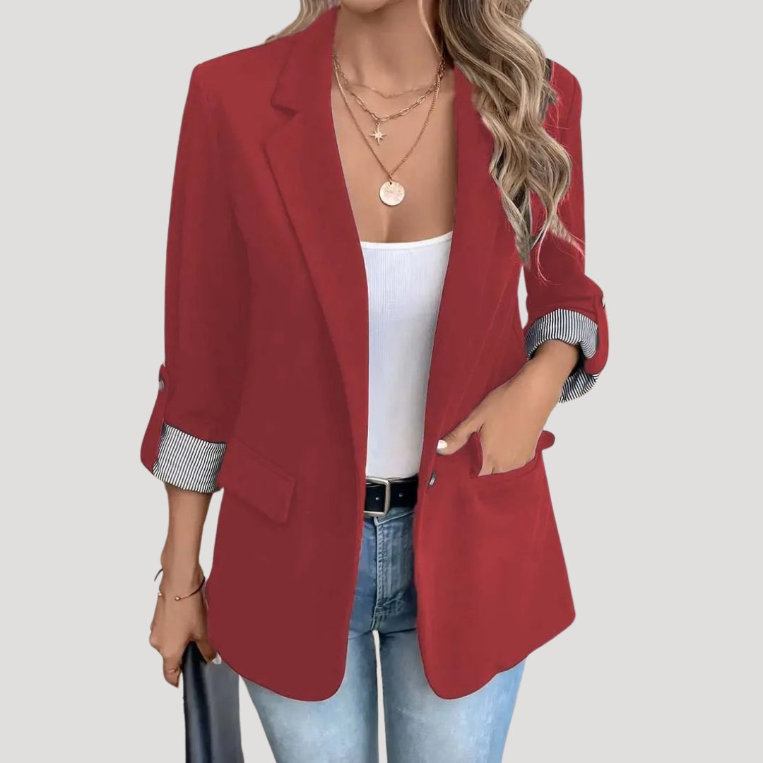 Elegant women's single-breasted tailored blazer, ideal professional wear & modern office fashion look.