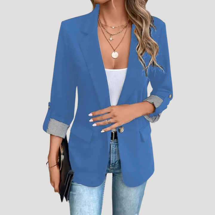 Chic women's casual roll-up sleeve blazer, offering a versatile & modern look for summer outfits.