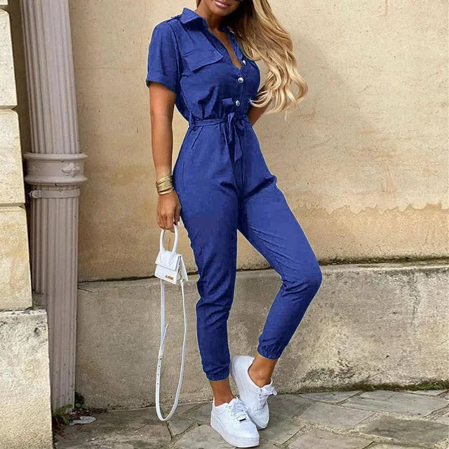 Full-length women's formal jumpsuit, emphasizing sleek lines & tailored design. Perfect for elegant evening wear.