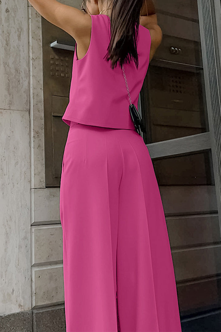 Professional women's two-piece set: sleeveless waistcoat & tailored wide-leg pants. Ideal for office workwear.