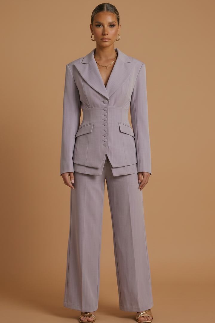 Front view of a women's professional suit, featuring a tailored blazer & chic wide-leg trousers.