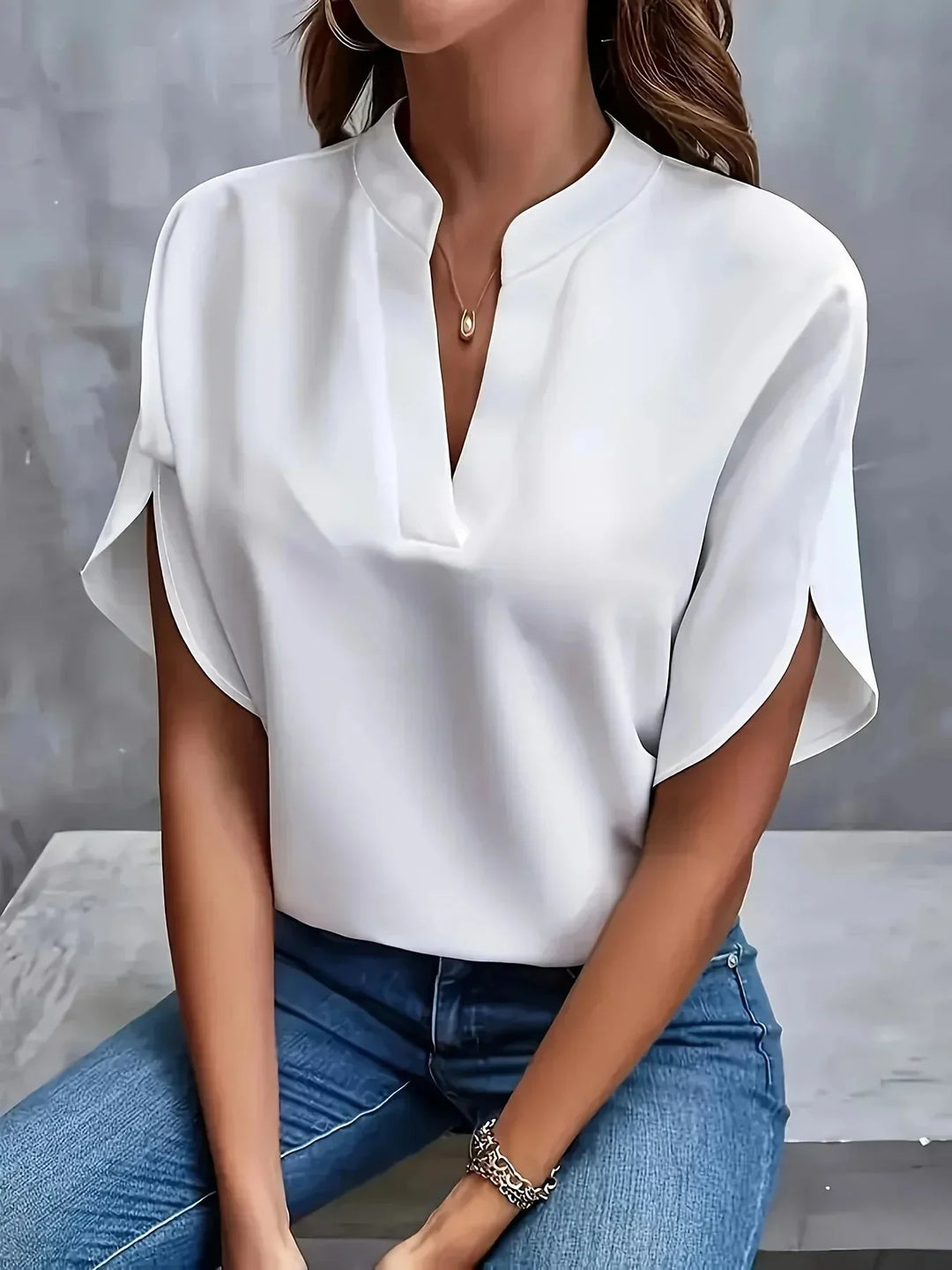 Chic women's V-neck blouse, tailored fit, stand collar, short sleeves. Versatile fashion top.