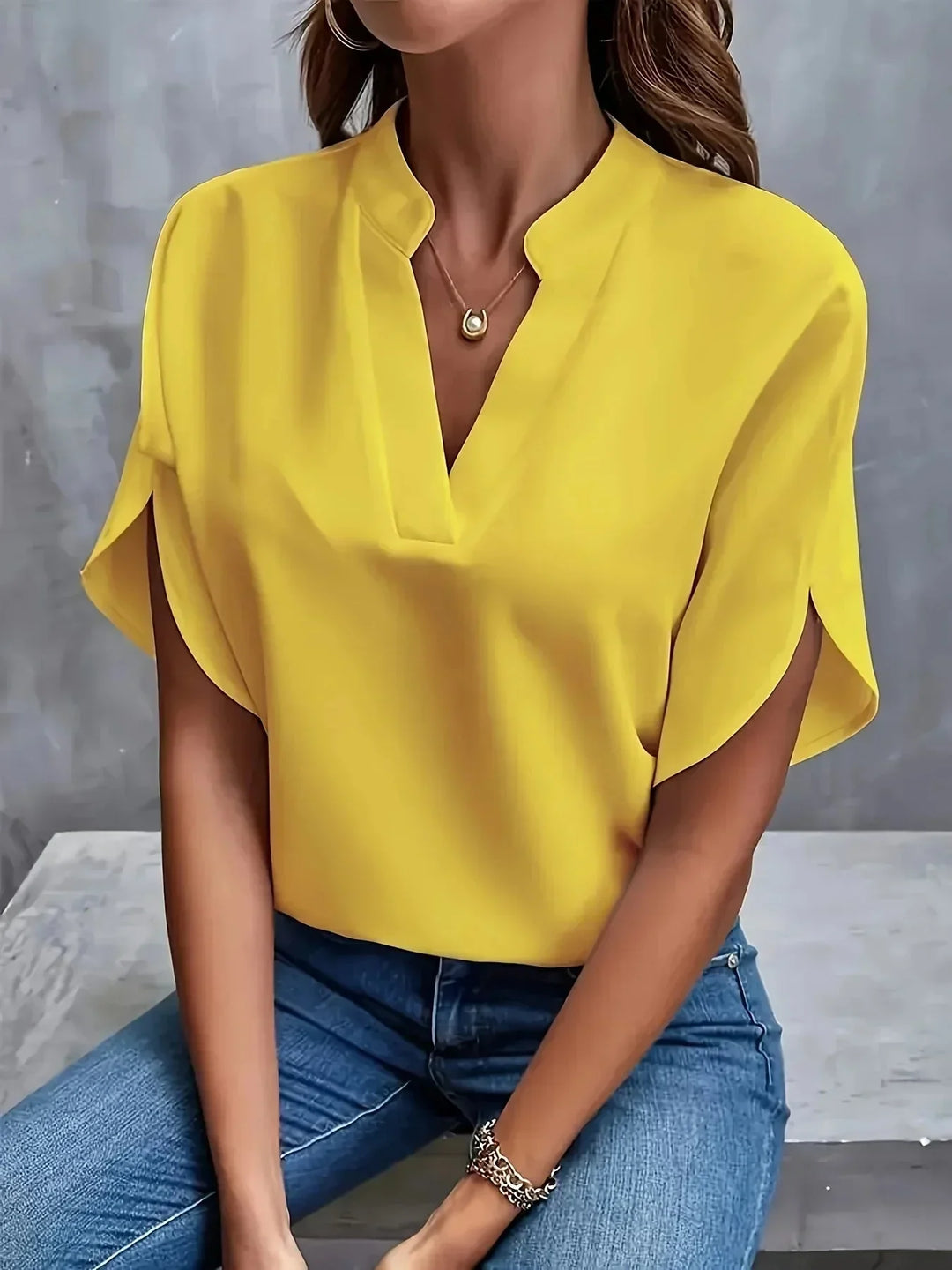 Professional women's tailored blouse, V-neck, stand collar, split short sleeves. Perfect for work.